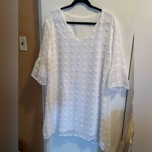 Beach cover or garden party look great in this simple but detailed dress